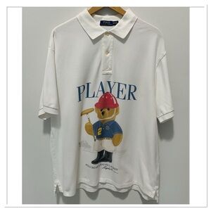 Polo By Ralph Lauren Polo Bear Rugby Player Graphic Polo Shirt White Blue 1XL